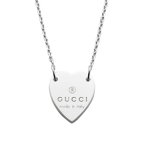 gold gucci heart necklace.